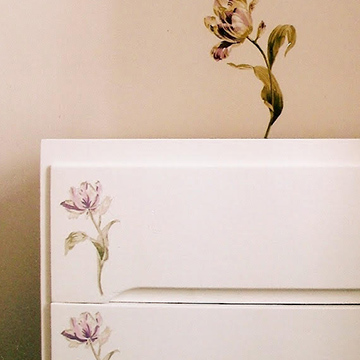 Hand painted furniture to match the surrounding wallpaper
