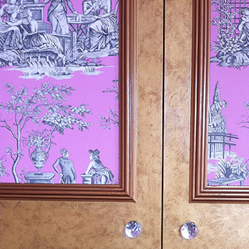 Broken colour metallic finish wardrobes with wallpaper inlay